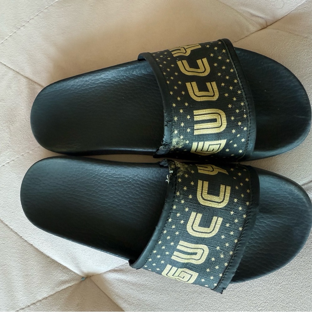 Gucci Black Slides with Gold Logo